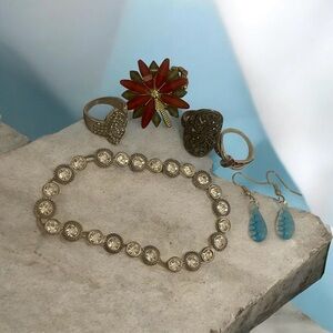 Source Unknown Red and Gold Ring Collection